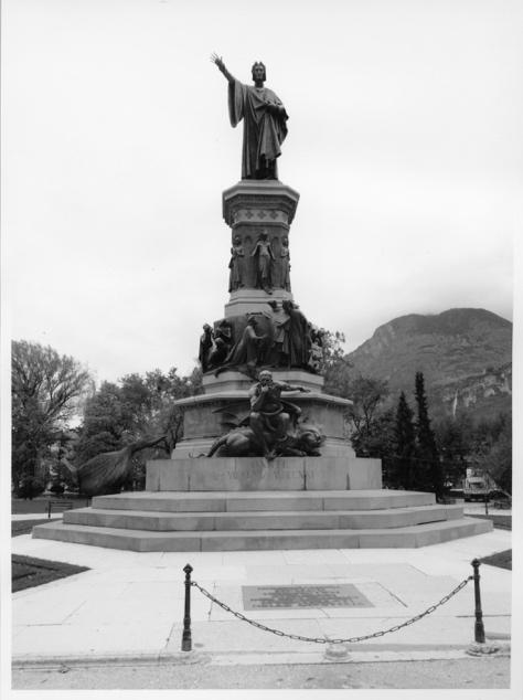 A statue of a person holding a sword

Description automatically generated