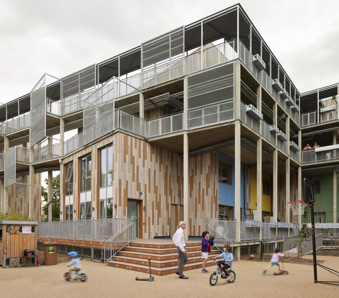 A building with a lot of stairs and balconies

AI-generated content may be incorrect.